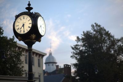 Widener clock with Old Main dome in the background