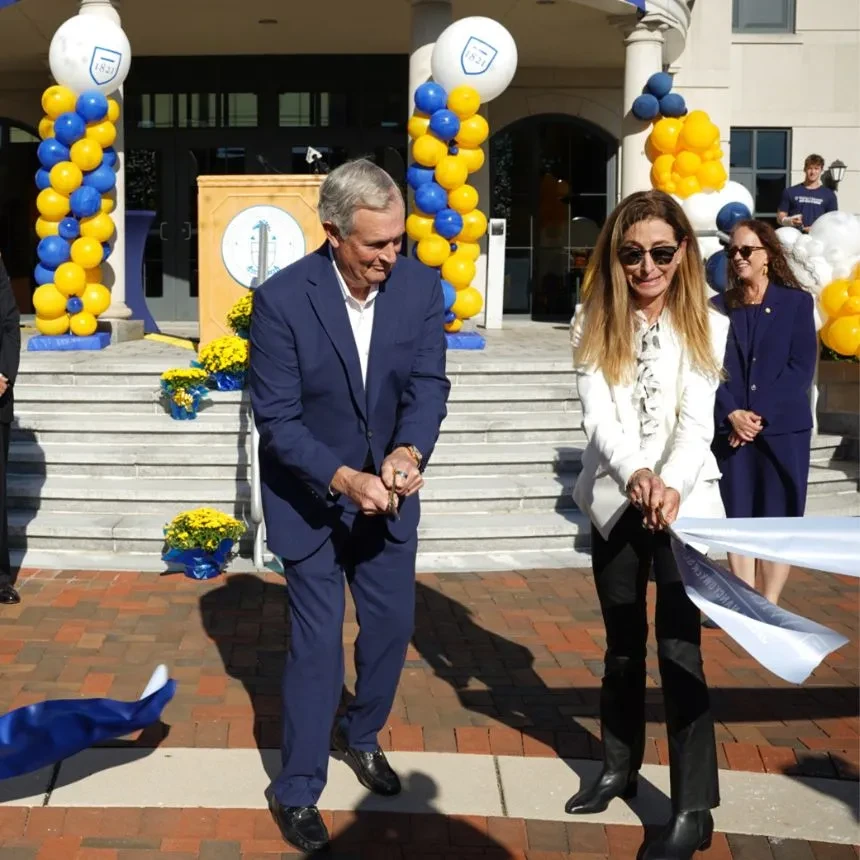 Jack and Nancy Dwyer cut the ribbon.