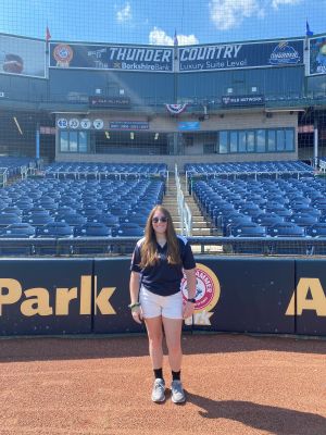 Allison Kovacs stands on the baseball field at Trenton Thunder ballpark