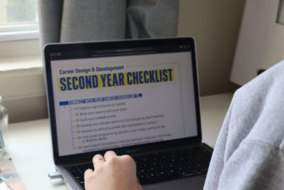 Laptop shows the Career Design and Development Checklist