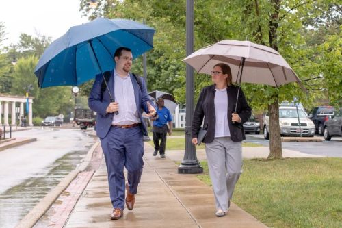 Colasante and Herschede walking 960 by 640 New trustee Domenic Colasante and Vice President Katie Herschede walk across campus.