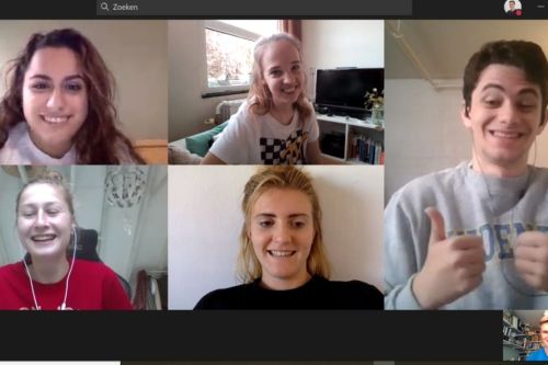 Students smile in Zoom image